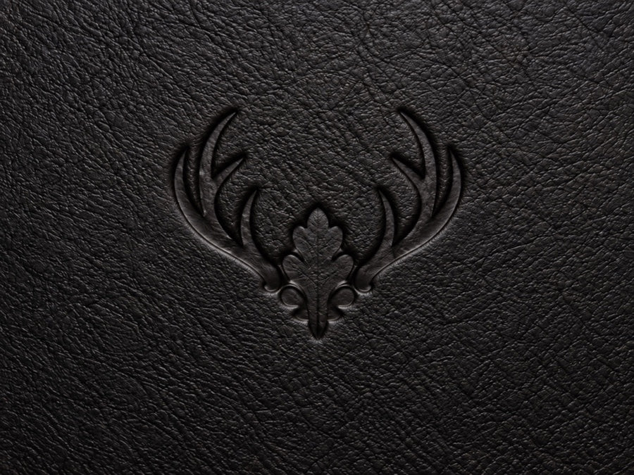 Close-up of the Oak Buck Maker’s Mark embossed in black leather