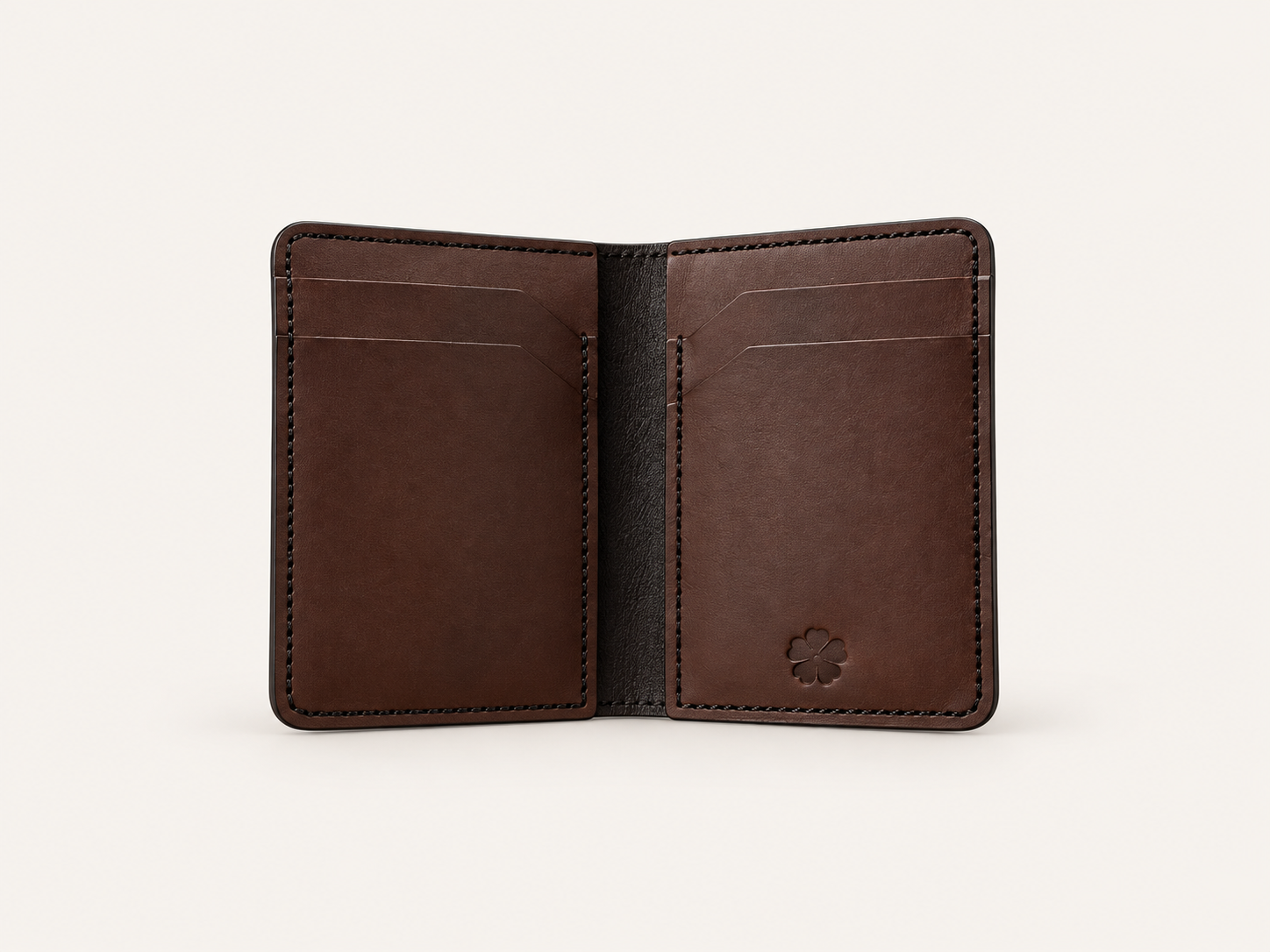 Open walnut OB-01 wallet on an off-white background, showing card slots, hidden pocket, and Heritage Seal