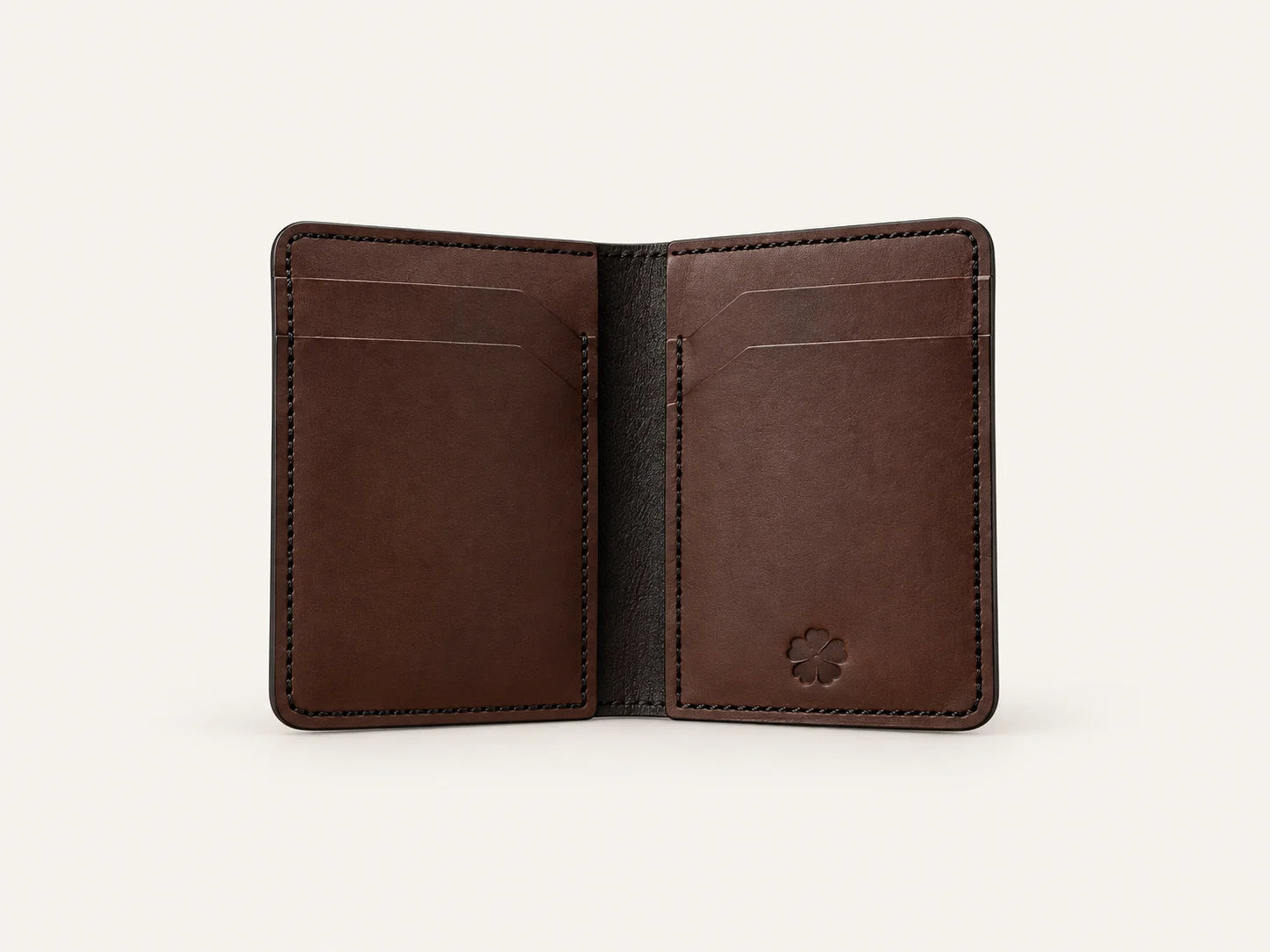 Open walnut OB-01 wallet interior on an off-white background