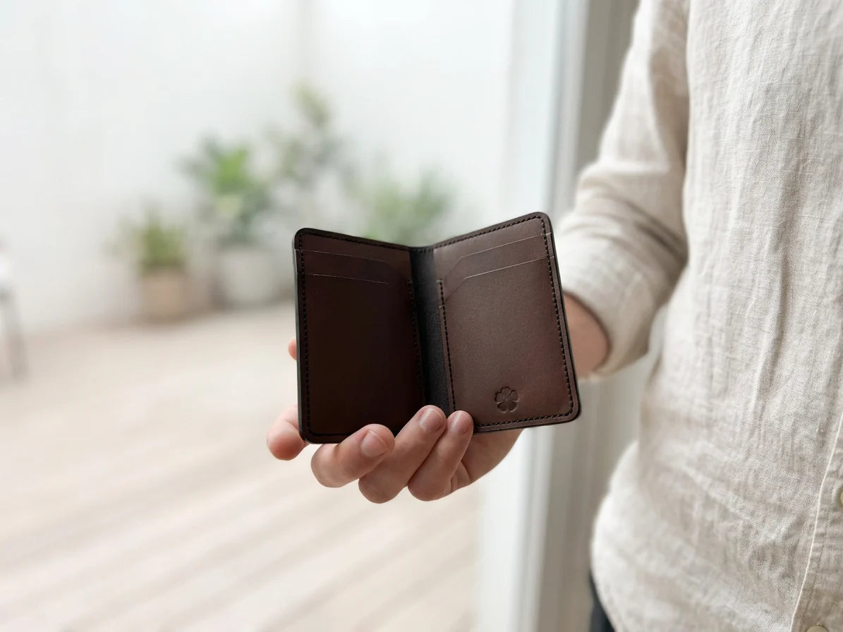 Open OB-01 wallet held in hand